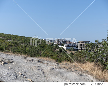 Black sea coast. bald mountain. Beautiful blue sea in Myskhako 125410545