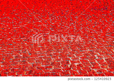 Red granite pavement. Granite paving stones, red stone, colorful background 125410923