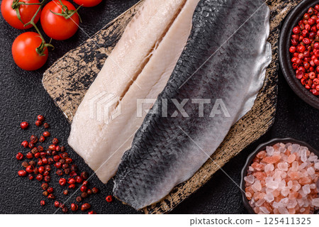 Herring fillet salted and marinated with salt, spices and oil 125411325