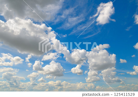 Fantastic soft white clouds and blue sky. 125411529