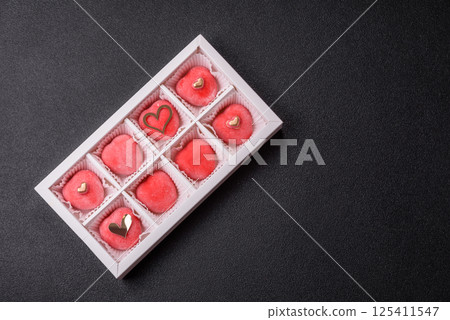 Delicious sweet mochi in the shape of red hearts Delicious sweet mochi in the shape of red hearts 125411547