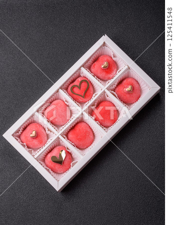 Delicious sweet mochi in the shape of red hearts Delicious sweet mochi in the shape of red hearts 125411548