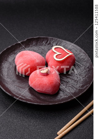 Delicious sweet mochi in the shape of red hearts Delicious sweet mochi in the shape of red hearts 125411588