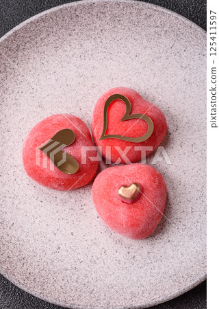 Delicious sweet mochi in the shape of red hearts Delicious sweet mochi in the shape of red hearts 125411597