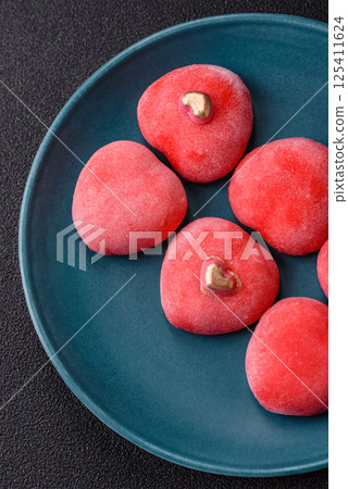 Delicious sweet mochi in the shape of red hearts 125411624