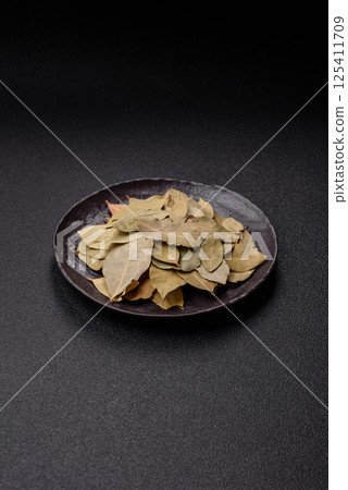 Dried bay leaves, spice, seasoning for cooking at home 125411709