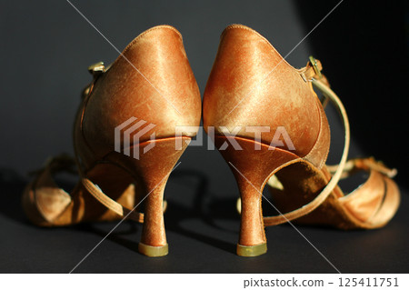 dancing shoes. Latin American dance shoes, cha-cha-cha, rumba, jive, samba, bachata 125411751