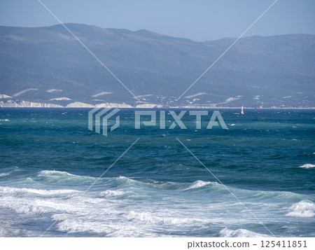 View of a stormy seascape of waves and the Black Sea View of a stormy seascape of waves and the Black Sea 125411851