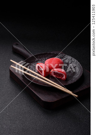 Delicious sweet mochi in the shape of red hearts 125411903
