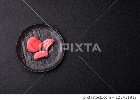 Delicious sweet mochi in the shape of red hearts 125411912