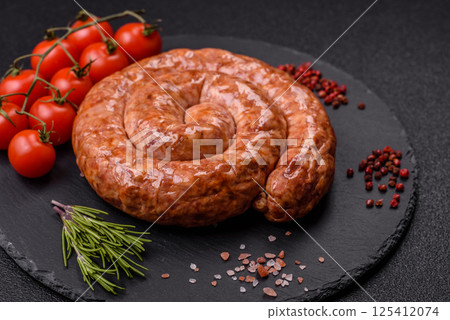 Delicious homemade sausage in the shape of a snail or spiral 125412074