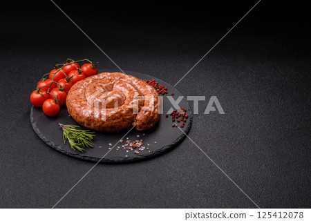 Delicious homemade sausage in the shape of a snail or spiral 125412078
