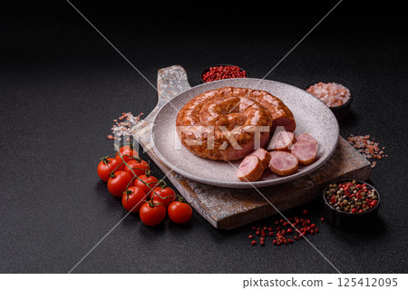Delicious homemade sausage in the shape of a snail or spiral 125412095