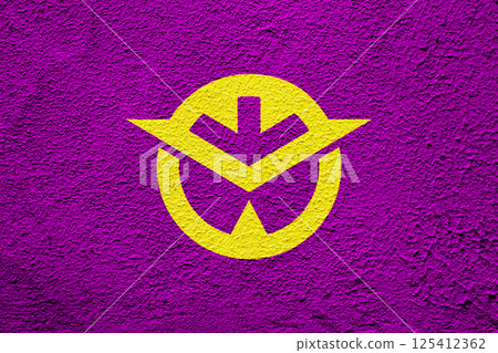 Official flag of Okayama. Prefecture in Japan. Conceptual collage on the texture of plastered wall 125412362