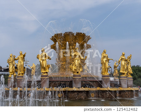 MOSCOW - JUNE 17, 2024: big beautiful golden fountain Friendship of people situated on exhibition of Economic achievements in Moscow, Russia 125412482