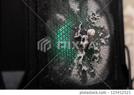 Dust clogging computer fan mesh reducing cooling performance Dust clogging computer fan mesh reducing cooling performance 125412521