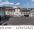 Abrau Durso, Russia 28 August 2024: The retro steamship Champagne is moored at the pier on the embankment of Lake Abrau-Durso 125412825