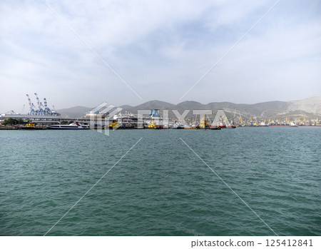 Novorossiysk, Russia 08.18.2023. Port cranes, Black Sea, port, Krasnodar Territory, Novorossiys 125412841