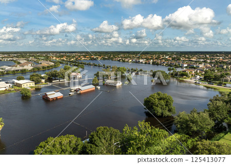 Hurricane Debby tropical rainstorm flooded farm homes in suburban area in Sarasota, Florida. Aftermath of natural disaster Hurricane Debby tropical rainstorm flooded farm homes in suburban area in Sarasota, Florida. Aftermath of natural disaster 125413077