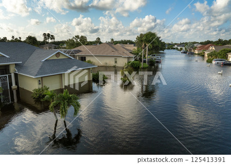 Flooded houses from hurricane Debby rainfall water in Laurel Meadows community in Sarasota, Florida. Aftermath of natural disaster in USA south 125413391