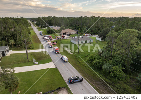 First responders investigating carbon monoxide gas hazard at residential home in Florida, USA 125413402