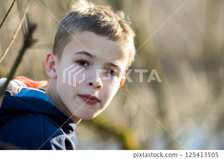 Closeup portrait of a funny child school boy. Closeup portrait of a funny child school boy. 125413505