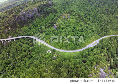 Car road trip on Blue Ridge Parkway in North Carolina Appalachian mountains. Observation overlook parking in summer season. Summertime landscape of beautiful nature 125413640