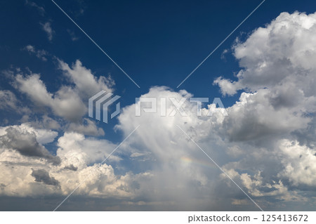 Blue sky with white clouds. Bright summer skyscape 125413672