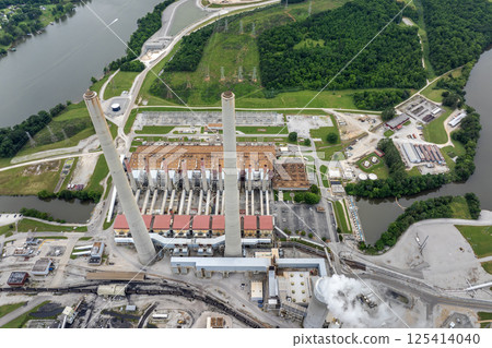 Aerial view of Kingston power plant in Roane County, Tennessee. Major coal-fired power plant producing electricity. Fossil fuel usage for energy production Aerial view of Kingston power plant in Roane County, Tennessee. Major coal-fired power plant producing electricity. Fossil fuel usage for energy production 125414040