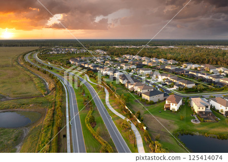 Aerial view of expensive residential houses in small town in southwest Florida. American dream homes as example of real estate development in US suburbs 125414074