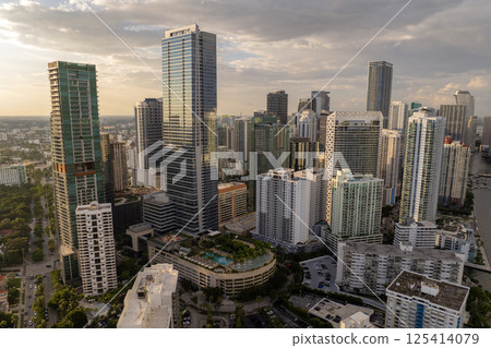 Aerial view of downtown office district of Miami Brickell in Florida, USA. High commercial and residential skyscraper buildings in modern American megapolis Aerial view of downtown office district of Miami Brickell in Florida, USA. High commercial and residential skyscraper buildings in modern American megapolis 125414079