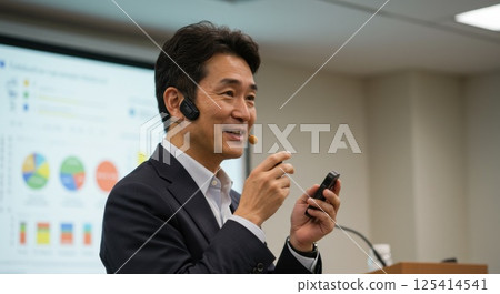 Japanese man giving a lecture using a speech device (AI generated image) Japanese man giving a lecture using a speech device (AI generated image) 125414541