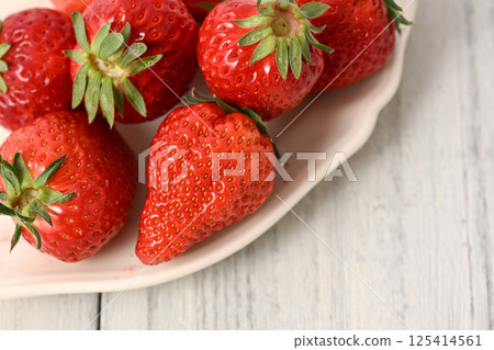 A lot of delicious looking strawberries A lot of delicious looking strawberries 125414561