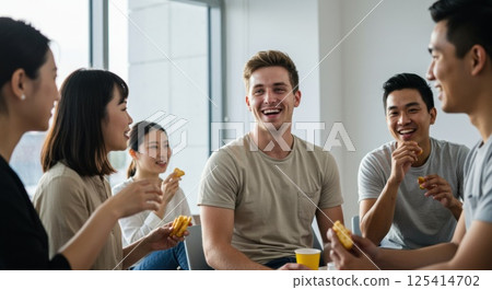Multinational team smiling during break (AI generated image) 125414702