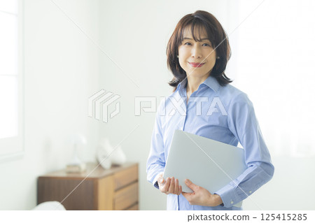 Portrait of a middle-aged woman Portrait of a middle-aged woman 125415285