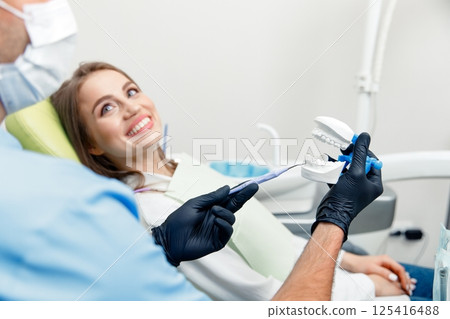 healthy teeth, dentist showing, patient dentist, Dental treatment, professional orthodontic, dentist concept, smiling, oral care, healthy teeth, dentist showing, patient dentist, Dental treatment, professional orthodontic, dentist concept, smiling, oral care, 125416488
