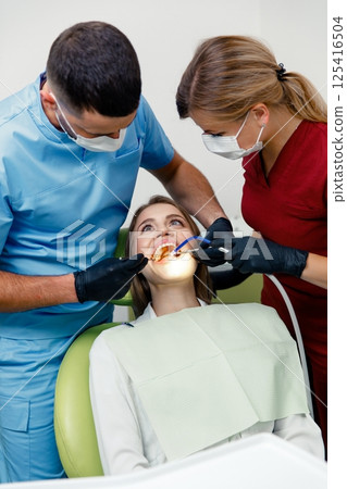 dental specialist, teeth check, dental diagnosis, dental care, dental examination, professional doctor fixing teeth, healthy teeth 125416504