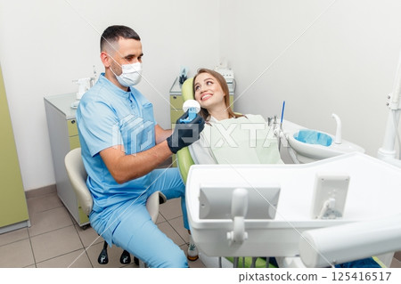 treating teeth, dental teeth model, dental tools, stomatological cabinet, dental check-up, dentistry professional, dental care 125416517