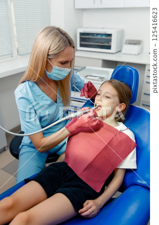Children's dentistry, Smiling dentist, pediatric dentist, healthy smile, Child visit dentist, stomatological cabinet, dental clinic 125416623