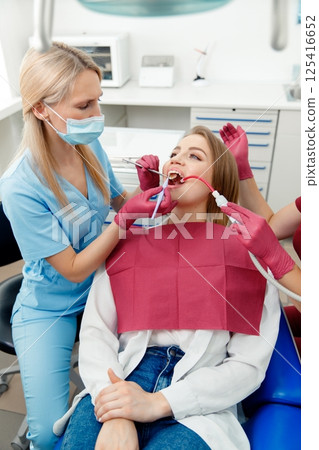 dentist concept, dental explorer, Stomatology cabinet, dental tools, examination patient, dental procedure, professional orthodontic clinic dentist concept, dental explorer, Stomatology cabinet, dental tools, examination patient, dental procedure, professional orthodontic clinic 125416652