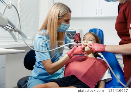 checking teeth, child dentist patient, Professional stomatology kid, professional doctor fixing teeth, dental specialist 125416657