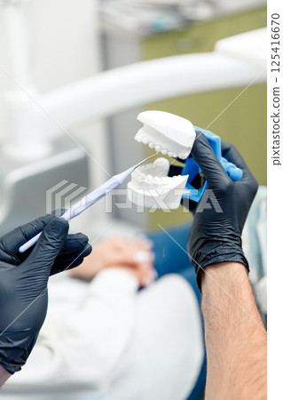 Dental care, dental procedure, healthy teeth, dental tools, stomatological cabinet, dentistry professional, doctor fixing teeth Dental care, dental procedure, healthy teeth, dental tools, stomatological cabinet, dentistry professional, doctor fixing teeth 125416670