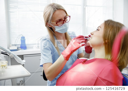 dental consultation, whitening dental clinic, dentist office, Dental treatment, dentist chair, dental specialist dental consultation, whitening dental clinic, dentist office, Dental treatment, dentist chair, dental specialist 125416729