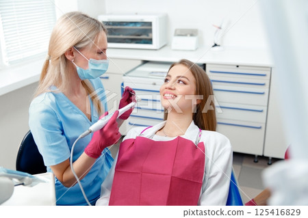 dental specialist, teeth check, dental diagnosis, dental care, dental examination, professional doctor fixing teeth, healthy teeth dental specialist, teeth check, dental diagnosis, dental care, dental examination, professional doctor fixing teeth, healthy teeth 125416829