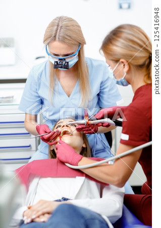 dental intervention, dental check-up, dental inspection, medical procedure, smiling patient, oral hygiene dental intervention, dental check-up, dental inspection, medical procedure, smiling patient, oral hygiene 125416948