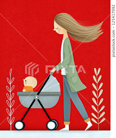 A young mother pushing a stroller with a baby in it 125417092