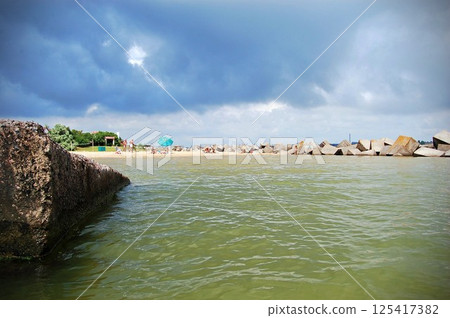 Storm is Coming to the Beach 125417382