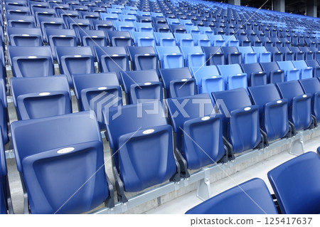 Seats lined up in the stadium Seats lined up in the stadium 125417637