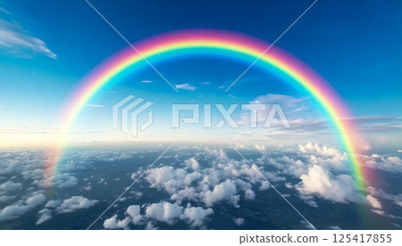 3DCG illustration of a drone or airplane point of view showing a rainbow hanging in the sky and a refreshing blue sky 125417855