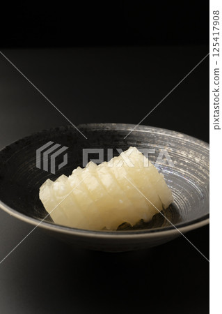 Bettara pickles on a black background Bettara pickles on a black background 125417908